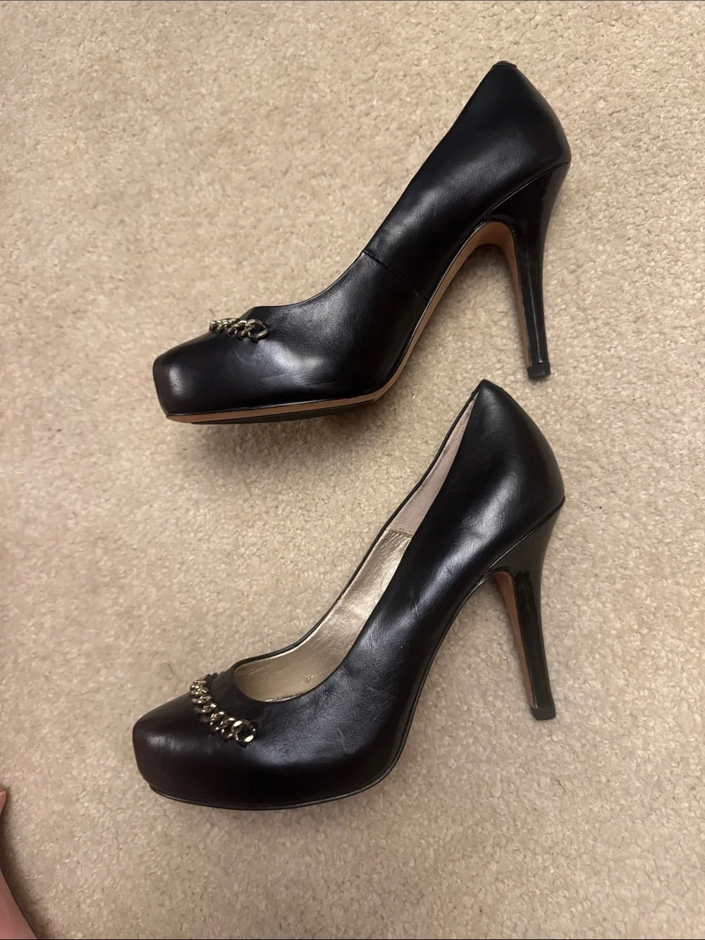 Isola Black Leather Pointed-Toe Pumps with Chain Trim